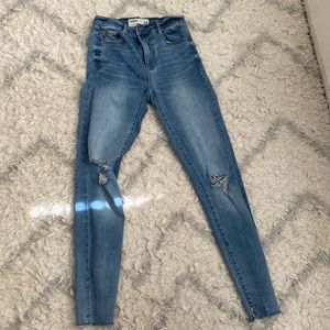 High rise light wash garage skinny jeans